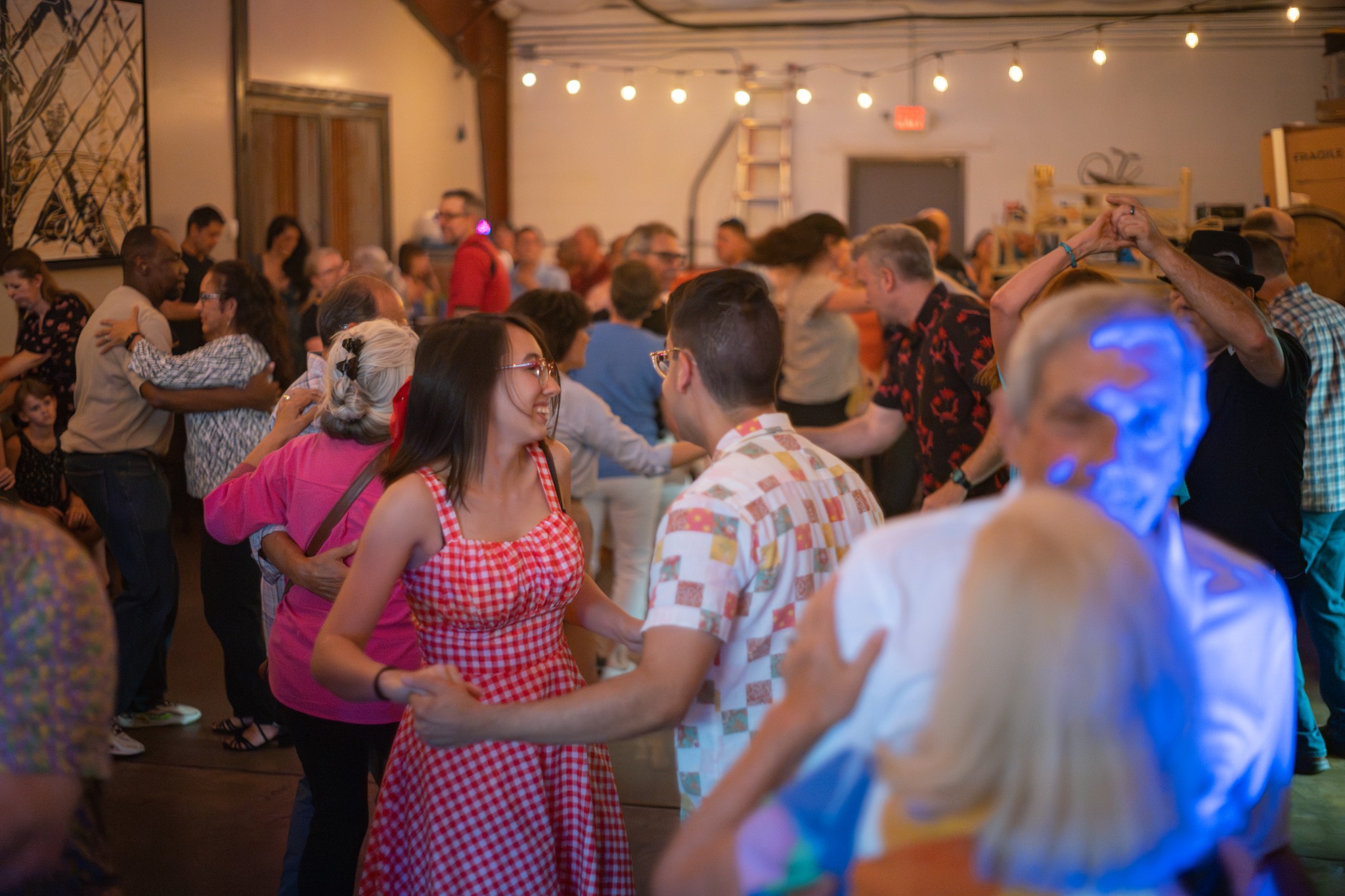 Swing dancers in motion
